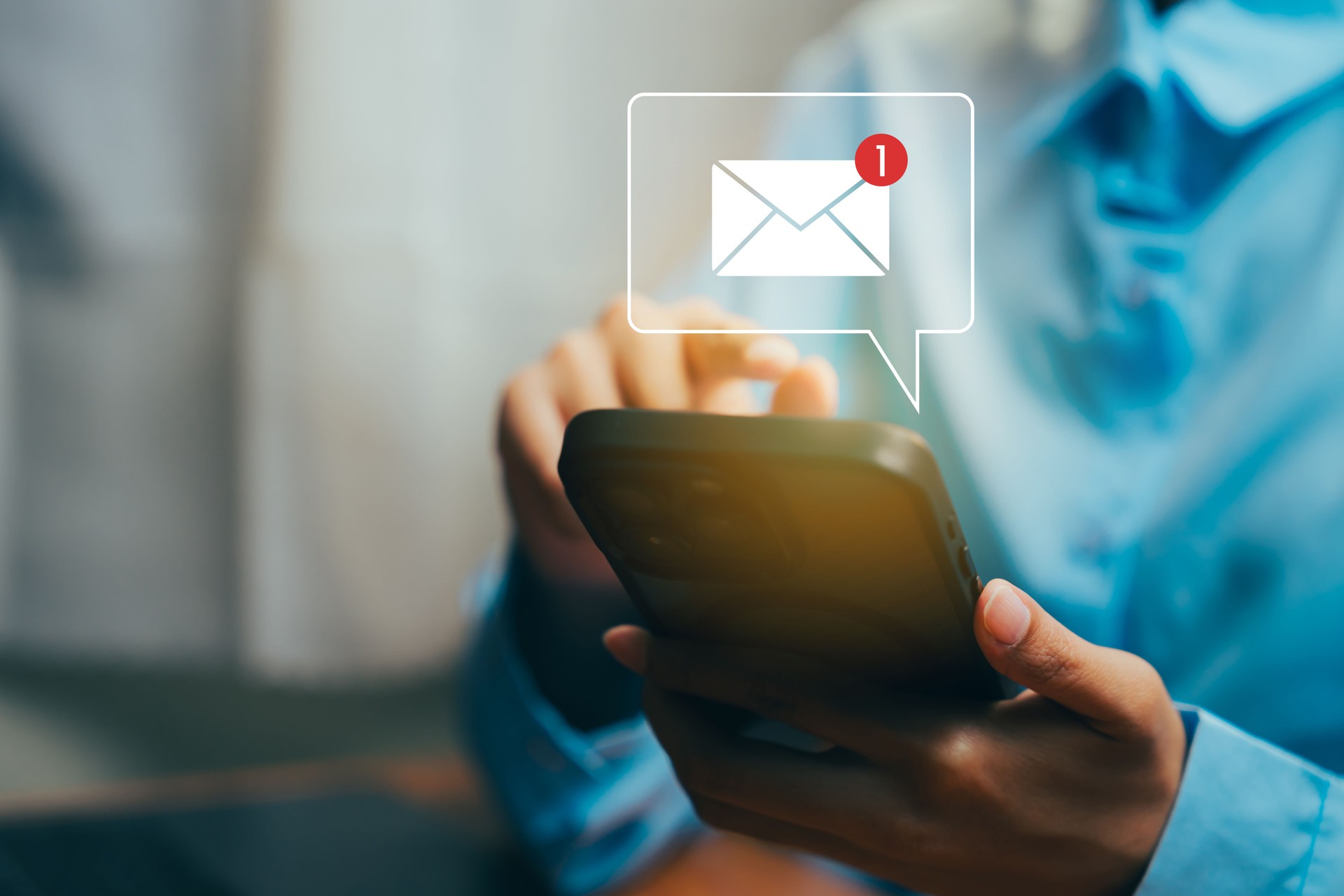 Person Using Smartphone with Notification of New Email Message on Screen, Business concept