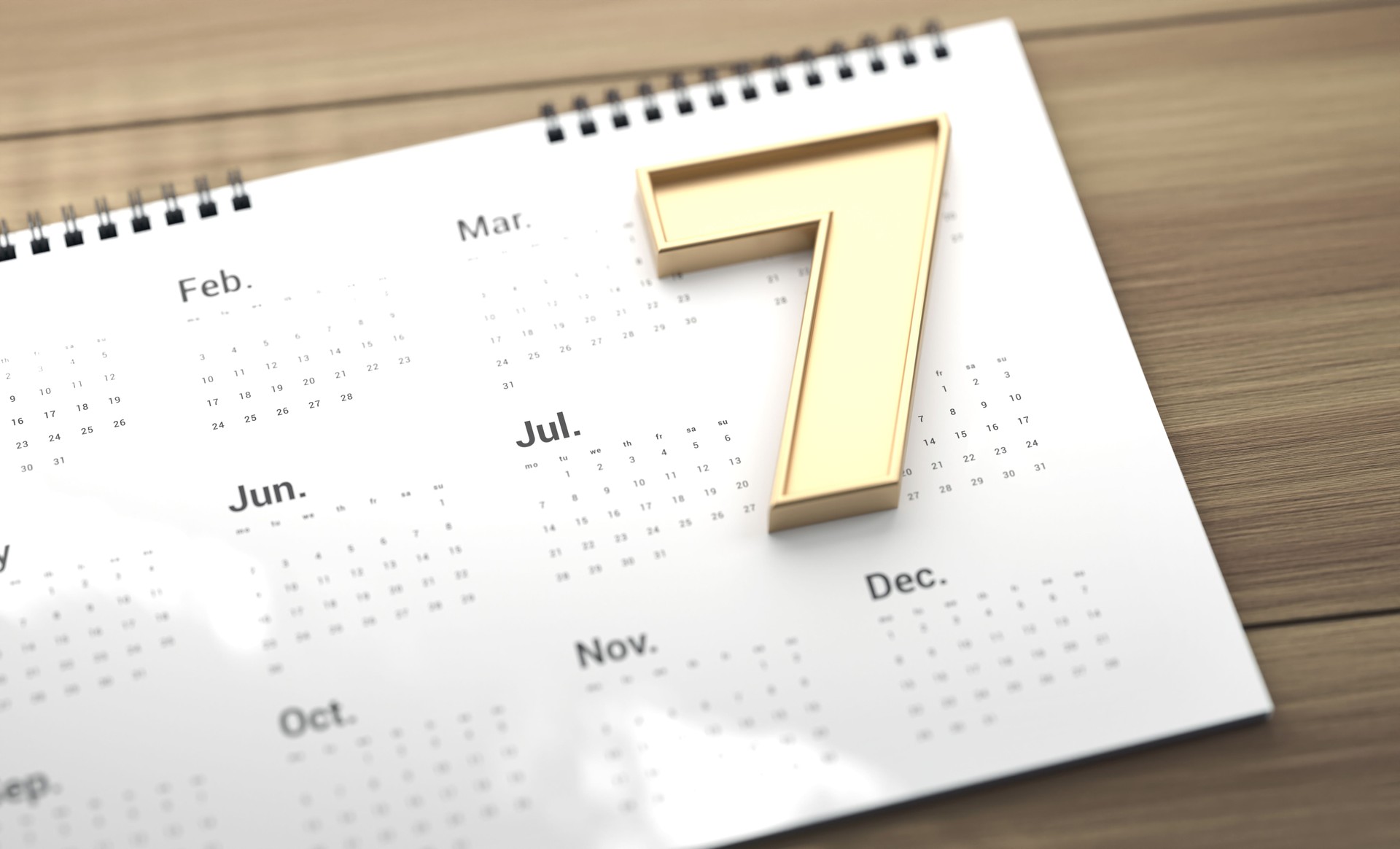 Gold Colored Number 7 And 2025 Calendar